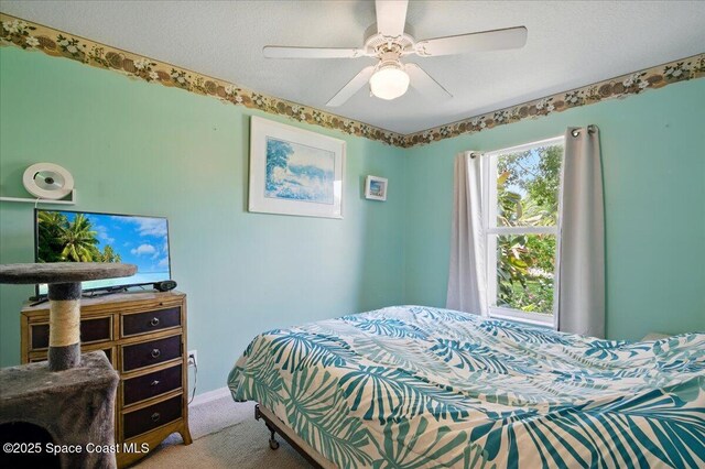 965 19th St SW, Vero Beach, FL 32962 - bedroom with carpet floors, ceiling fan, and baseboards