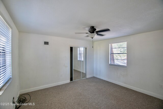 5510 Howell Branch Rd, Winter Park, FL 32792 - empty room featuring carpet, ceiling fan, and baseboards