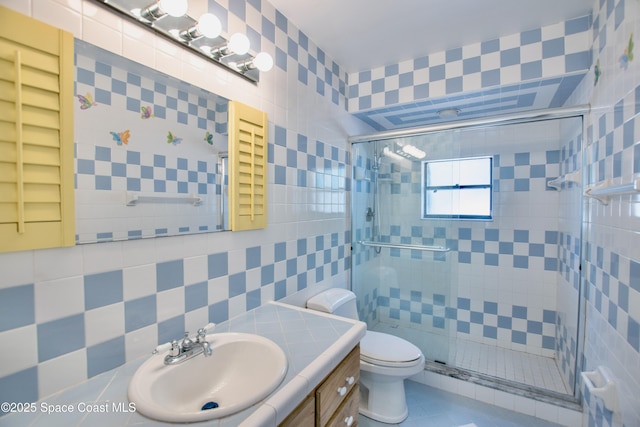 5510 Howell Branch Rd, Winter Park, FL 32792 - full bath with tile walls, a shower stall, vanity, toilet, and backsplash