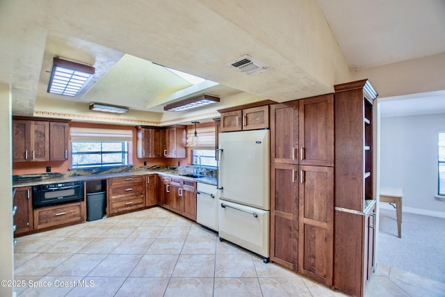 5510 Howell Branch Rd, Winter Park, FL 32792 - kitchen featuring white appliances and light tile patterned flooring