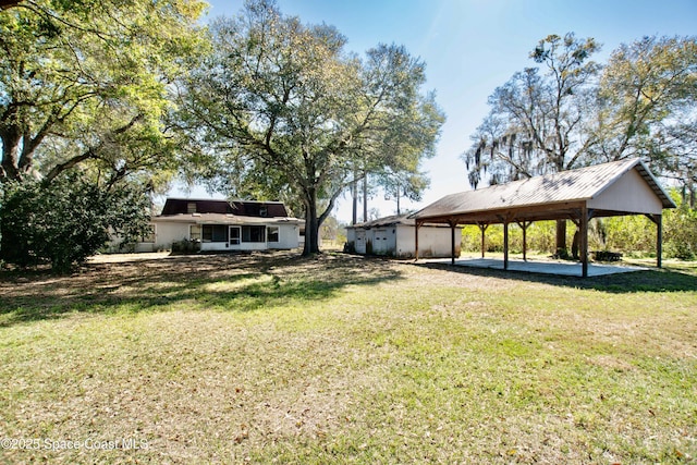 5510 Howell Branch Rd, Winter Park, FL 32792 - view of grassy yard featuring a carport