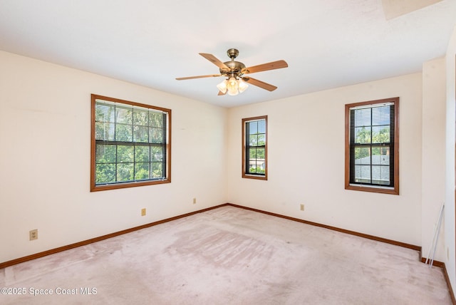 174 Peckham St NE, Palm Bay, FL 32907 - empty room with baseboards and light colored carpet