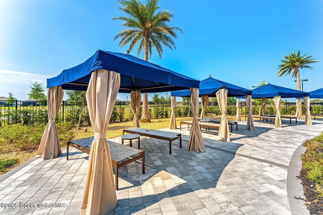 8854 Alister Dr, Melbourne, FL 32940 - view of community with a gazebo and a patio