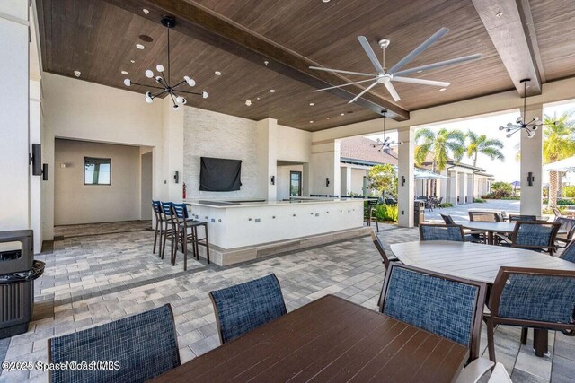 8854 Alister Dr, Melbourne, FL 32940 - view of patio / terrace featuring a ceiling fan and outdoor dining space