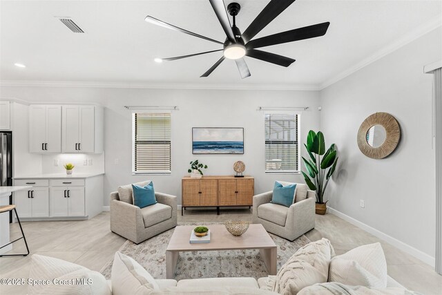 8854 Alister Dr, Melbourne, FL 32940 - living room with crown molding, ceiling fan, and baseboards