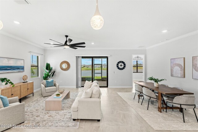 8854 Alister Dr, Melbourne, FL 32940 - living area featuring recessed lighting, crown molding, plenty of natural light, a ceiling fan, and baseboards
