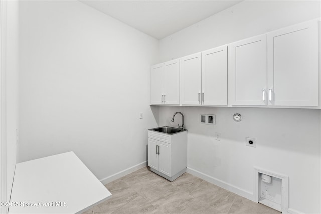 8854 Alister Dr, Melbourne, FL 32940 - washroom with hookup for an electric dryer, cabinet space, hookup for a washing machine, gas dryer hookup, and baseboards