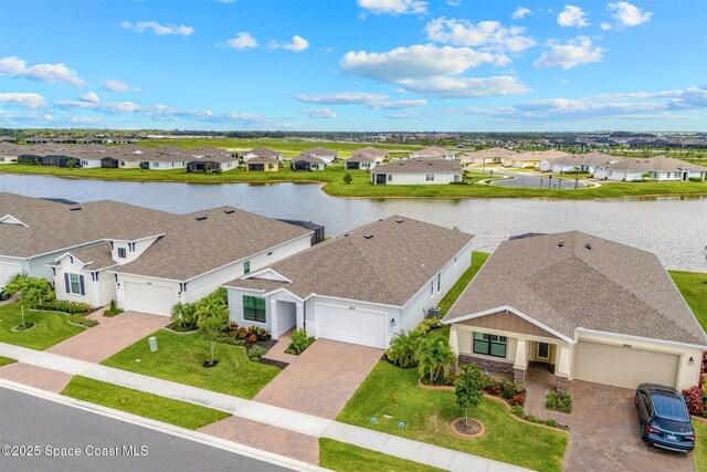 8854 Alister Dr, Melbourne, FL 32940 - aerial perspective of suburban area with a nearby body of water