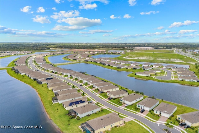 8854 Alister Dr, Melbourne, FL 32940 - aerial perspective of suburban area featuring a large body of water