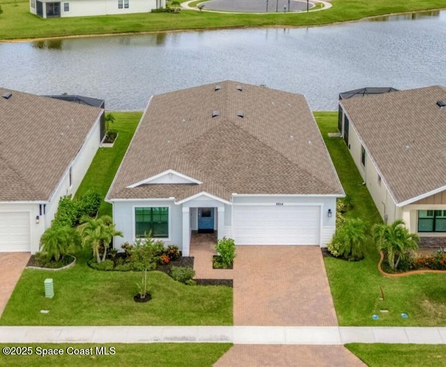 8854 Alister Dr, Melbourne, FL 32940 - aerial view of property and surrounding area featuring a large body of water
