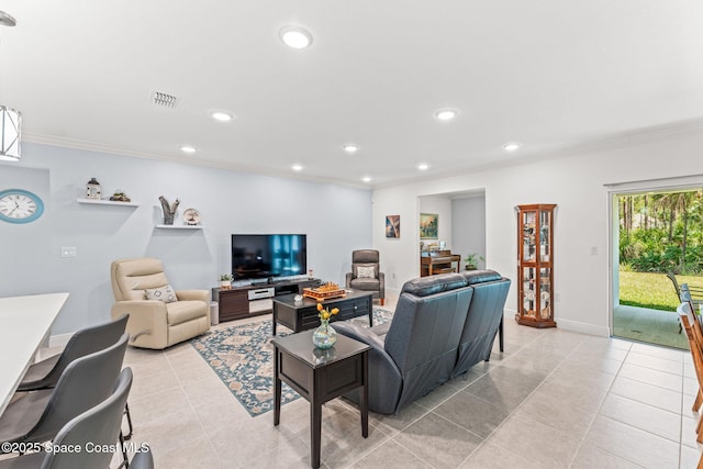 916 Corbin Cir SW, Palm Bay, FL 32908 - living area featuring crown molding, light tile patterned floors, recessed lighting, and baseboards