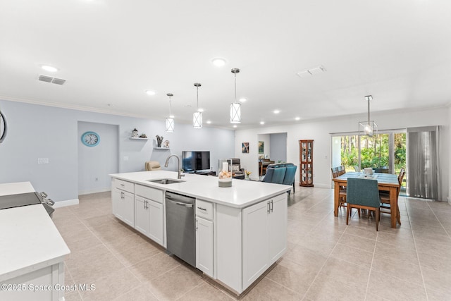 916 Corbin Cir SW, Palm Bay, FL 32908 - kitchen featuring dishwasher, light countertops, an island with sink, a sink, and white cabinets