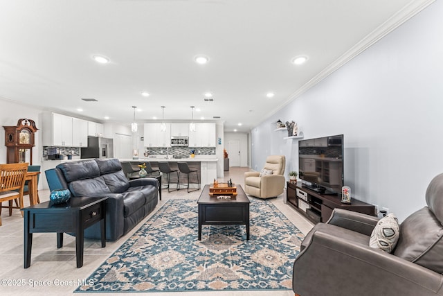 916 Corbin Cir SW, Palm Bay, FL 32908 - living room featuring ornamental molding, recessed lighting, and light tile patterned floors