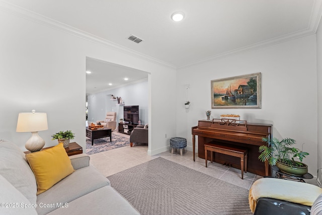 916 Corbin Cir SW, Palm Bay, FL 32908 - living room with crown molding, light tile patterned floors, baseboards, and recessed lighting