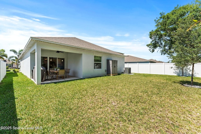 916 Corbin Cir SW, Palm Bay, FL 32908 - rear view of house featuring ceiling fan, stucco siding, central AC, and a patio area