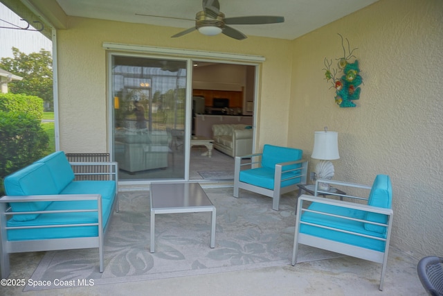 view of patio featuring a ceiling fan and an outdoor hangout area
