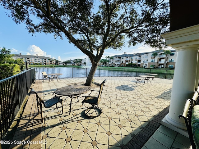 6421 Borasco Dr, Melbourne, FL 32940 - view of patio featuring a water view