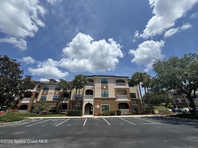 6421 Borasco Dr, Melbourne, FL 32940 - view of building exterior with uncovered parking
