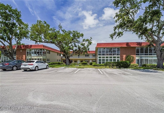 18 Vista Palm Ln Unit 102, Vero Beach, FL 32962 - view of uncovered parking lot