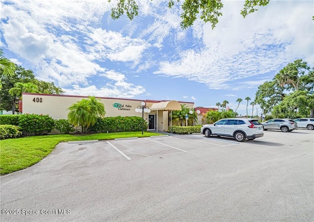 18 Vista Palm Ln Unit 102, Vero Beach, FL 32962 - view of uncovered parking lot