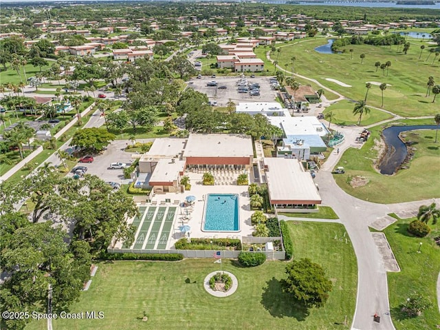 18 Vista Palm Ln Unit 102, Vero Beach, FL 32962 - aerial view of property's location featuring a large body of water, a golf club, and a pool area