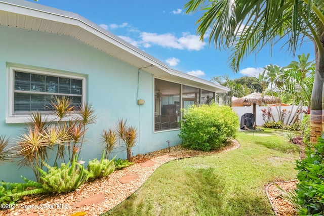 1029 Palmer Rd, Rockledge, FL 32955 - view of yard with a sunroom