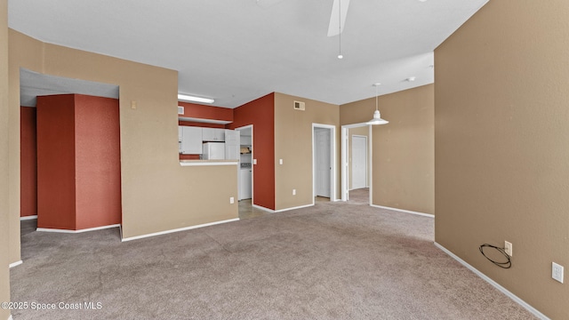 1766 Sophias Dr Unit 204, Melbourne, FL 32940 - unfurnished living room featuring ceiling fan, carpet floors, and baseboards