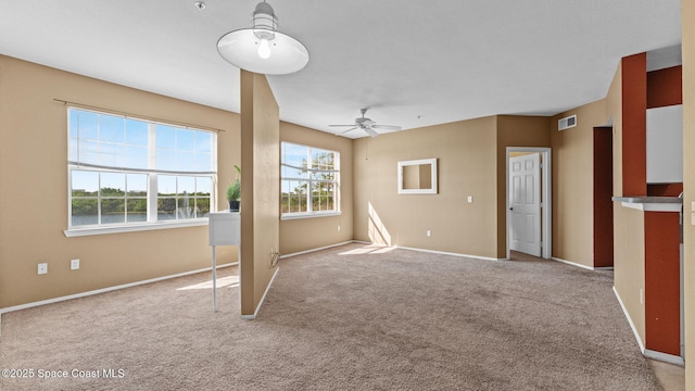 1766 Sophias Dr Unit 204, Melbourne, FL 32940 - unfurnished living room with a ceiling fan, carpet, and baseboards