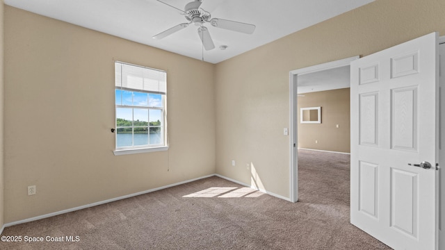 1766 Sophias Dr Unit 204, Melbourne, FL 32940 - empty room featuring carpet floors, ceiling fan, and baseboards