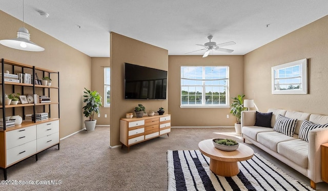 1766 Sophias Dr Unit 204, Melbourne, FL 32940 - living room featuring ceiling fan and light colored carpet