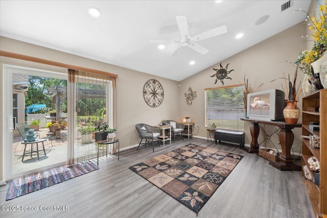 1160 Waco Blvd SE, Palm Bay, FL 32909 - living area featuring wood finished floors, baseboards, a ceiling fan, lofted ceiling, and recessed lighting