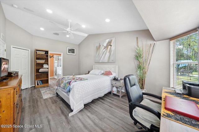 1160 Waco Blvd SE, Palm Bay, FL 32909 - bedroom with wood finished floors, a desk, lofted ceiling, a ceiling fan, and recessed lighting