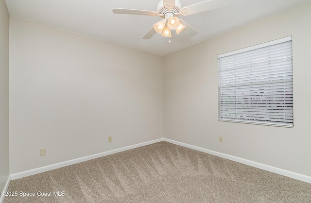 5460 Holden Rd, Cocoa, FL 32927 - carpeted spare room featuring baseboards and a ceiling fan