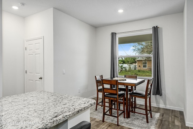 1717 Dalroy St NW, Palm Bay, FL 32907 - dining room with wood finished floors, baseboards, and recessed lighting