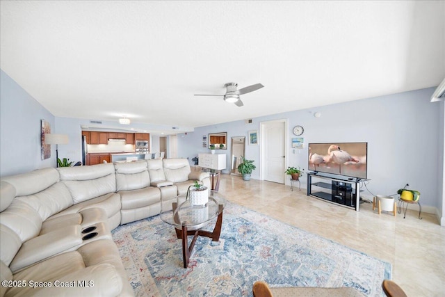 121 Lancha Cir Unit 206, Indian Harbour Beach, FL 32937 - living room with a ceiling fan and light marble finish floors