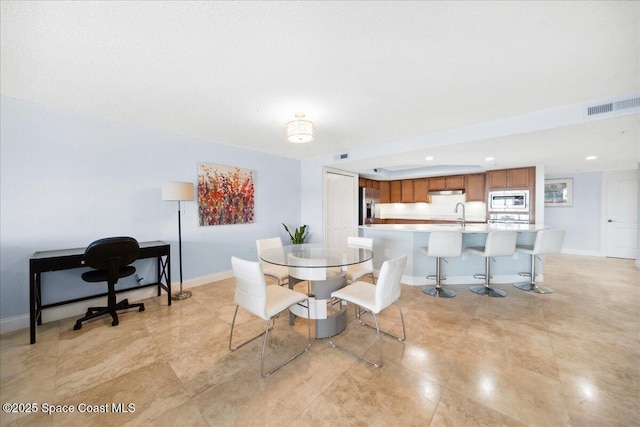 121 Lancha Cir Unit 206, Indian Harbour Beach, FL 32937 - dining area with recessed lighting and baseboards