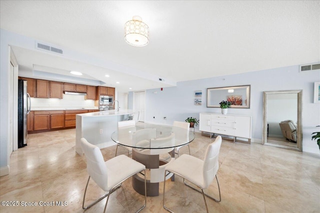 121 Lancha Cir Unit 206, Indian Harbour Beach, FL 32937 - dining area with baseboards, light tile patterned floors, and recessed lighting