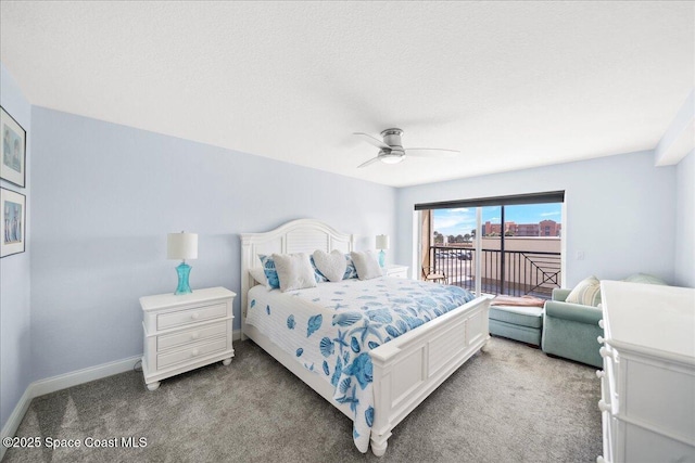 121 Lancha Cir Unit 206, Indian Harbour Beach, FL 32937 - bedroom with access to exterior, carpet, a ceiling fan, and baseboards