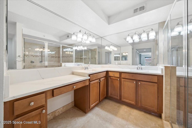 121 Lancha Cir Unit 206, Indian Harbour Beach, FL 32937 - bathroom featuring double vanity, a stall shower, and tile patterned flooring