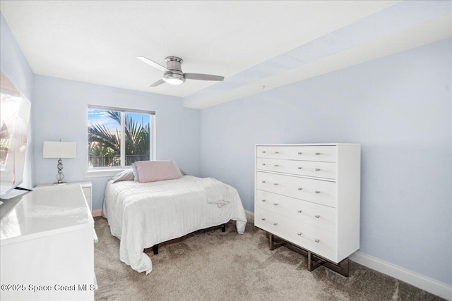 121 Lancha Cir Unit 206, Indian Harbour Beach, FL 32937 - bedroom featuring light carpet, baseboards, and ceiling fan