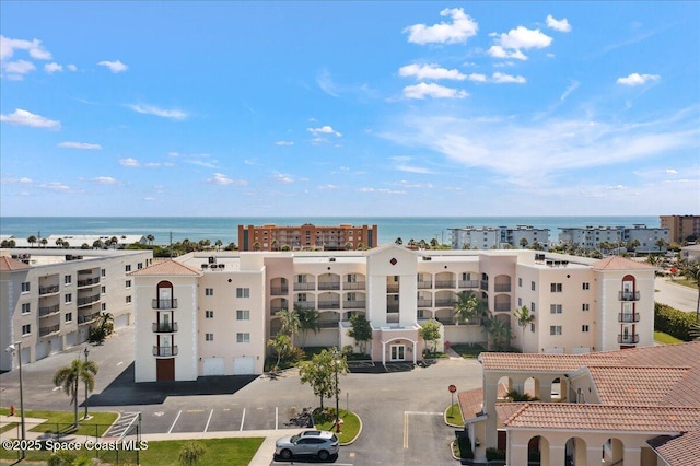 121 Lancha Cir Unit 206, Indian Harbour Beach, FL 32937 - drone / aerial view of a large body of water and apartment complex