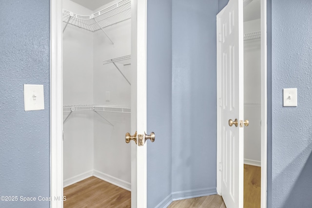 6827 Dodge Rd, Cocoa, FL 32927 - walk in closet featuring wood finished floors