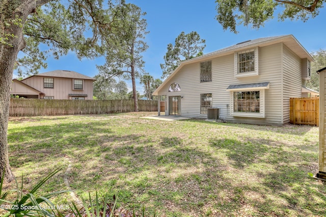 6827 Dodge Rd, Cocoa, FL 32927 - back of property featuring a patio and central AC unit