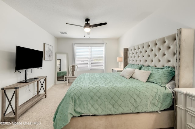 1460 Glendale Ave NW, Palm Bay, FL 32907 - bedroom with light colored carpet, a ceiling fan, and baseboards