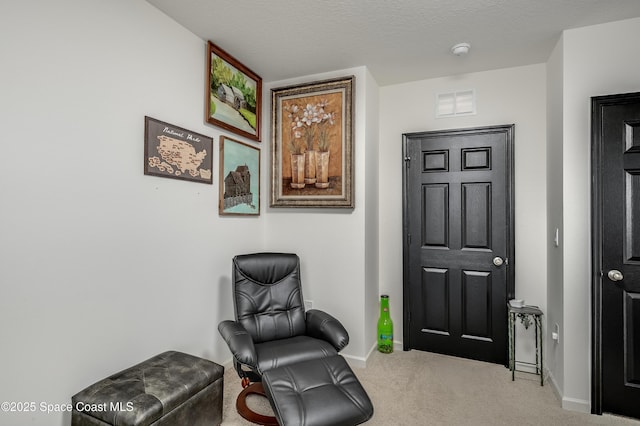 1460 Glendale Ave NW, Palm Bay, FL 32907 - sitting room with carpet floors and baseboards