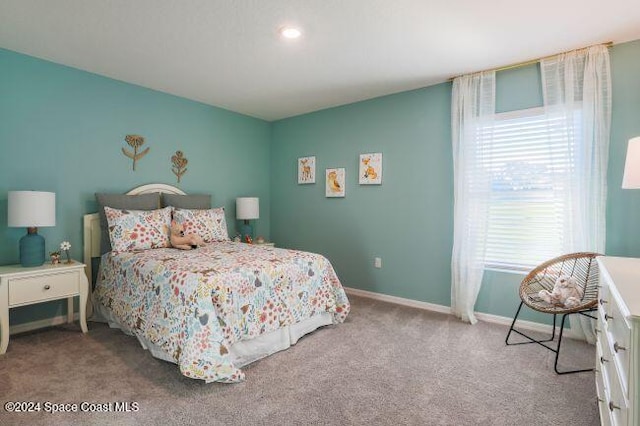 817 Redrock St SE, Palm Bay, FL 32909 - carpeted bedroom featuring baseboards
