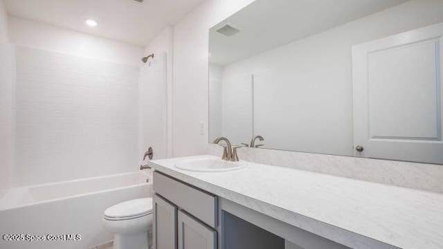 817 Redrock St SE, Palm Bay, FL 32909 - bathroom with vanity, toilet, and shower / washtub combination