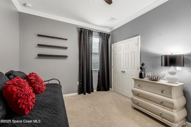 738 Old Country SE, Palm Bay, FL 32909 - bedroom featuring crown molding, light carpet, baseboards, a ceiling fan, and a closet