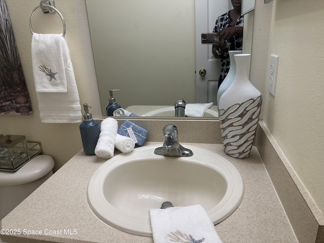 2259 Cogan Dr, Palm Bay, FL 32909 - bathroom view of vanity and toilet