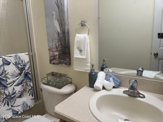 2259 Cogan Dr, Palm Bay, FL 32909 - full bathroom featuring toilet and vanity